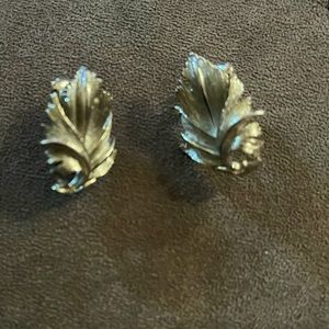 Vintage TARA clip on silver tone earrings